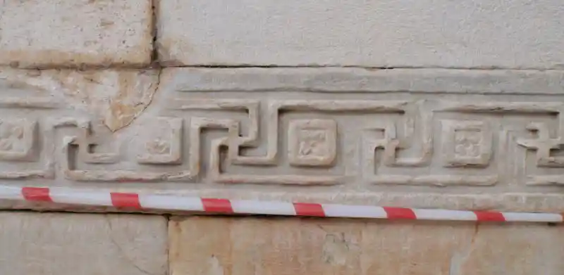 Marble stone with long-armed swastika